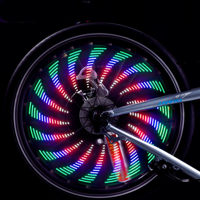 Feux Vélo LED Jante 32 Motifs - Éclairage Étanche Coloré - Camp de Base Farzen